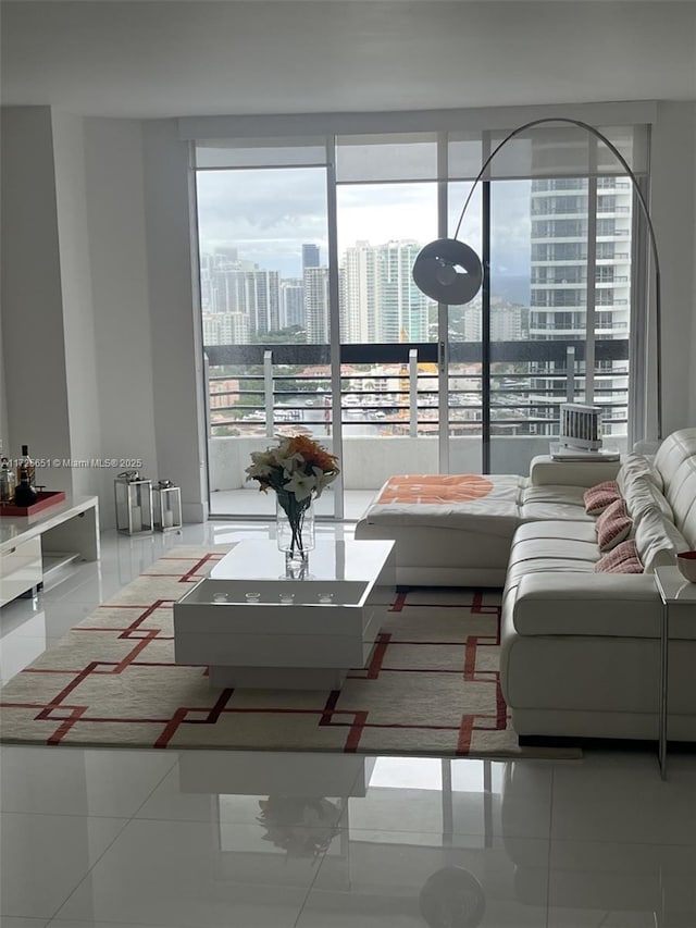 unfurnished living room with tile patterned floors and a wealth of natural light