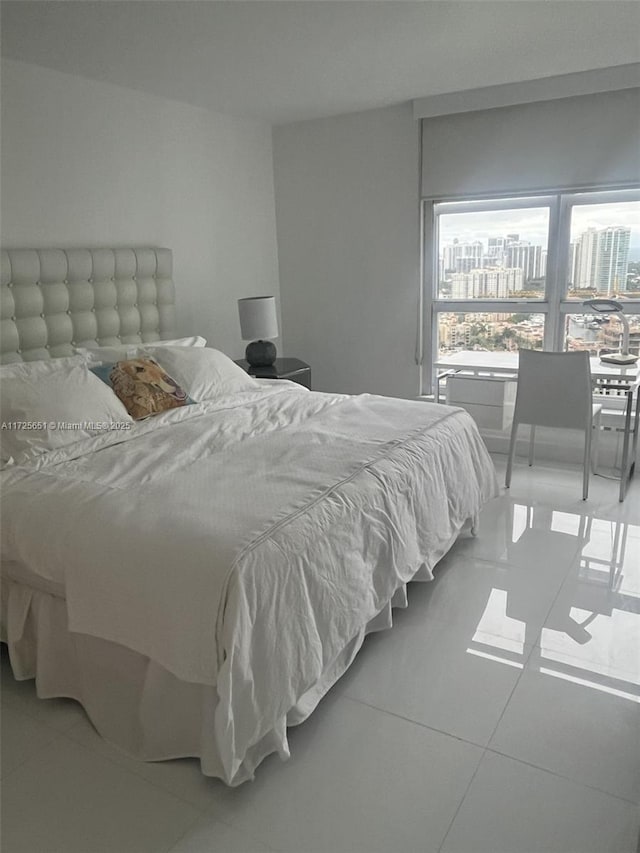 bedroom featuring tile patterned floors