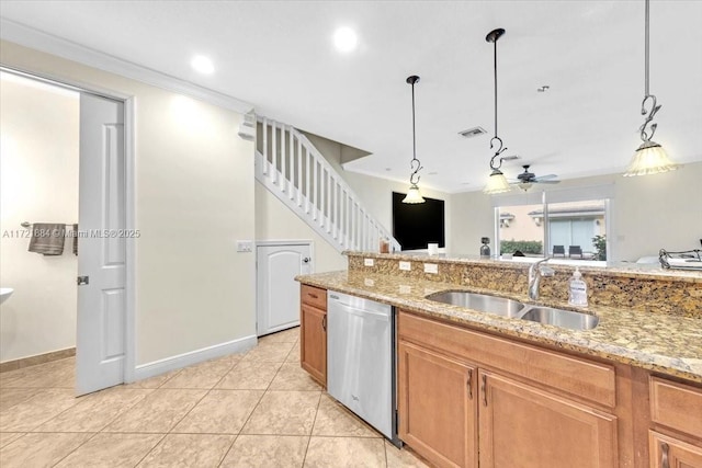 kitchen featuring ceiling fan, hanging light fixtures, stainless steel dishwasher, and sink