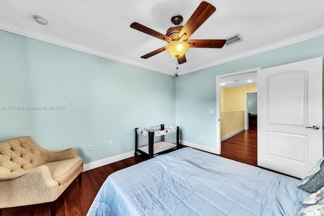 bedroom with dark wood-type flooring, ceiling fan, and crown molding