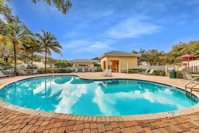 view of swimming pool featuring a patio