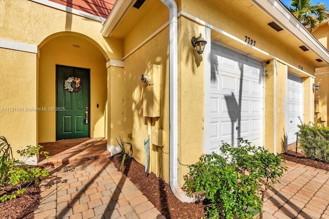 entrance to property with a garage