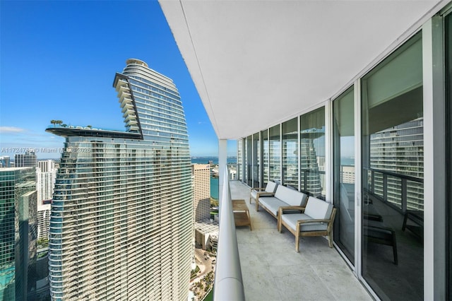 balcony featuring a water view