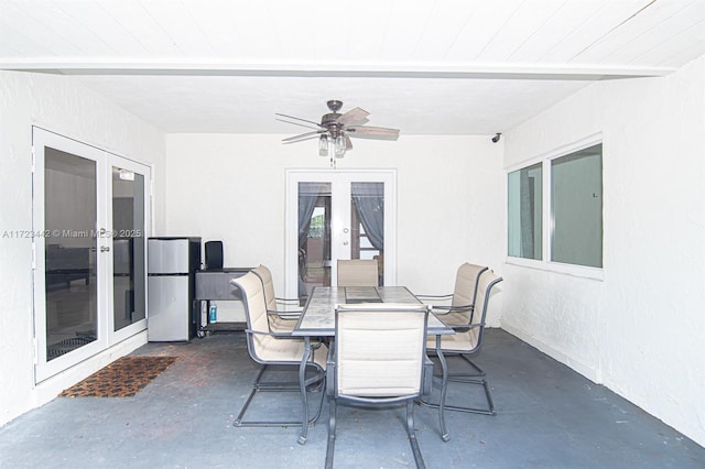 view of patio with ceiling fan and french doors