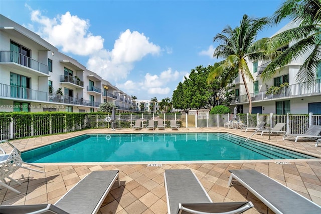 view of swimming pool with a patio