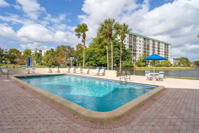 view of swimming pool with a patio area