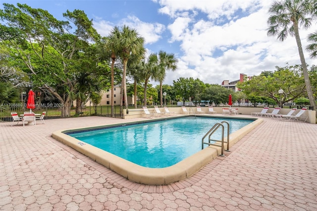 view of swimming pool featuring a patio