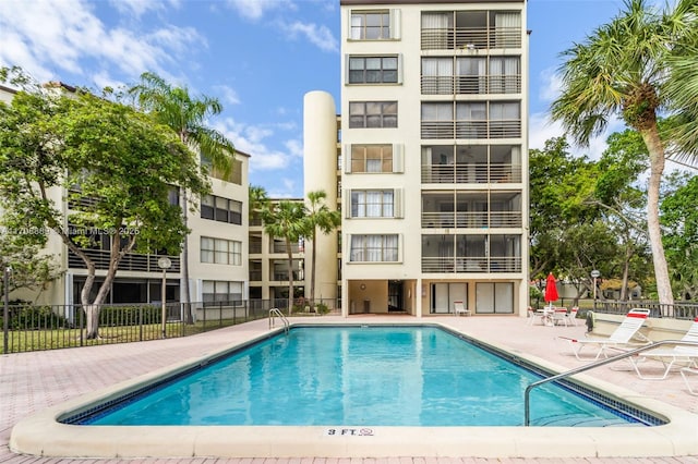 view of pool featuring a patio