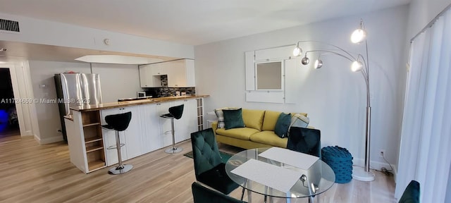 living room featuring light wood-type flooring