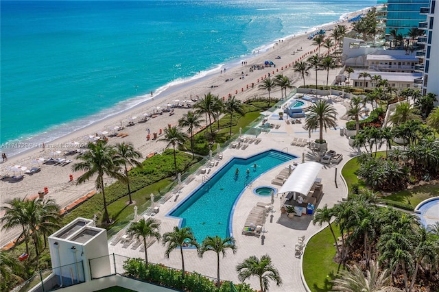 drone / aerial view with a view of the beach and a water view