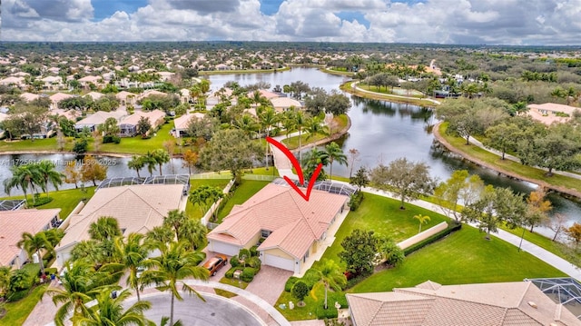 birds eye view of property featuring a water view