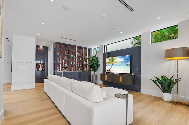 living room with light hardwood / wood-style floors