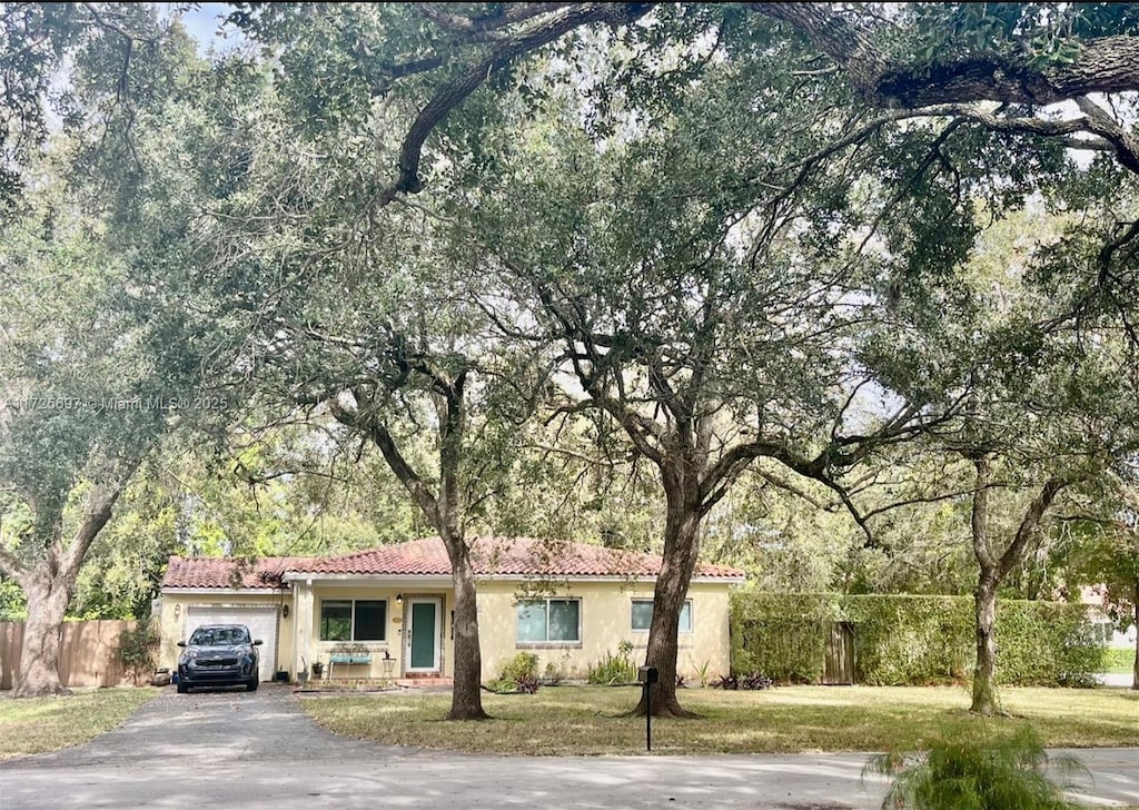 view of front of property with a garage