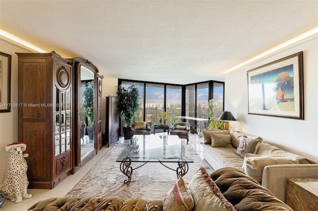 living room featuring a textured ceiling and expansive windows