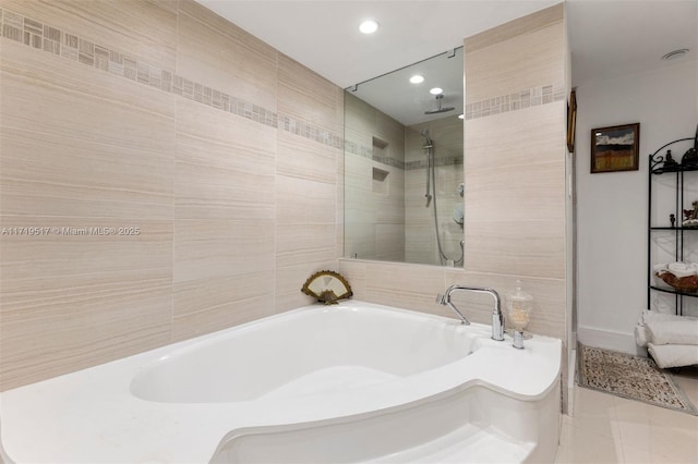 bathroom with tile walls, plus walk in shower, and tile patterned floors