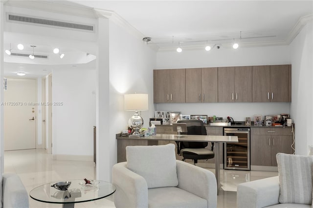 interior space with ornamental molding, light tile patterned floors, and wine cooler