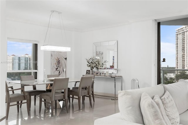 dining room with ornamental molding