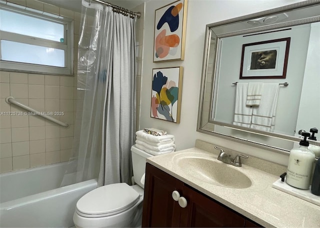 full bathroom with toilet, shower / bath combination with curtain, and vanity