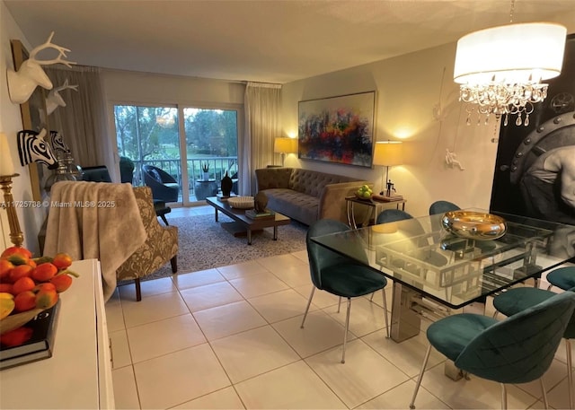 living room featuring a notable chandelier and light tile patterned flooring