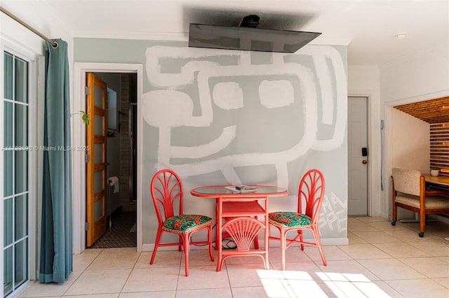 tiled dining room with crown molding