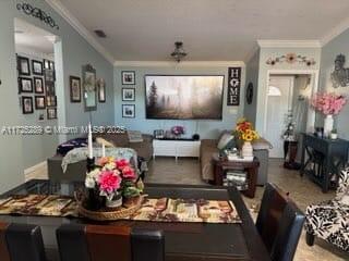 dining area featuring ornamental molding