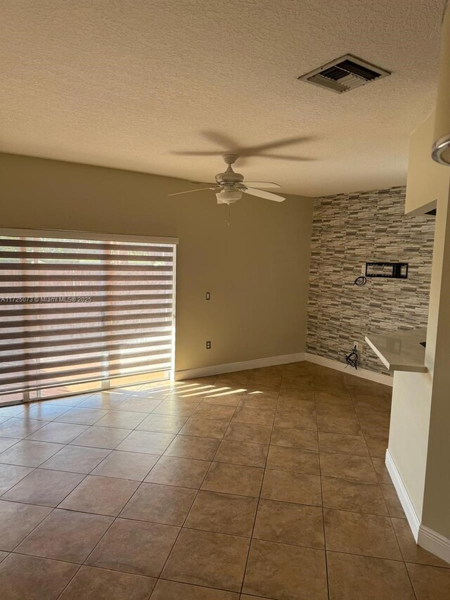 corridor featuring a textured ceiling