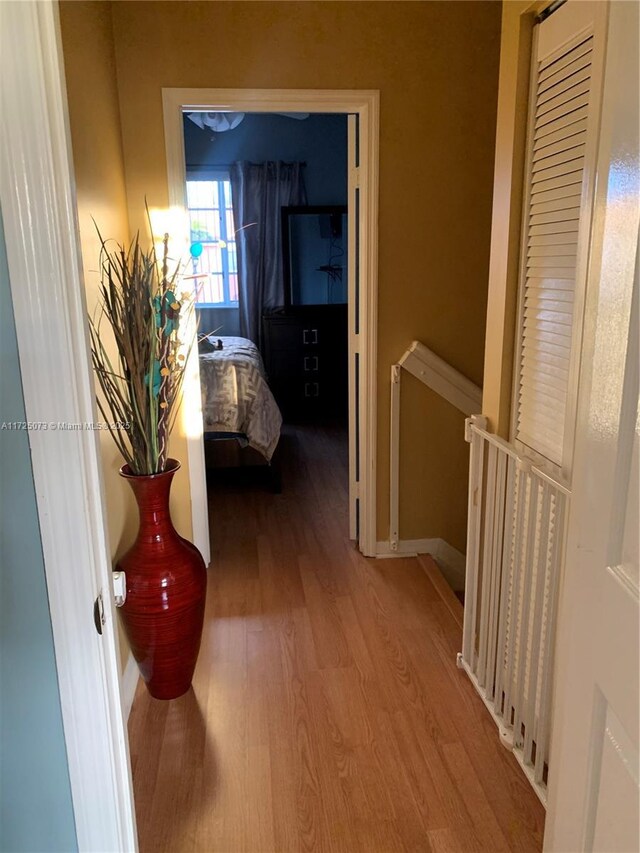 stairway featuring an inviting chandelier