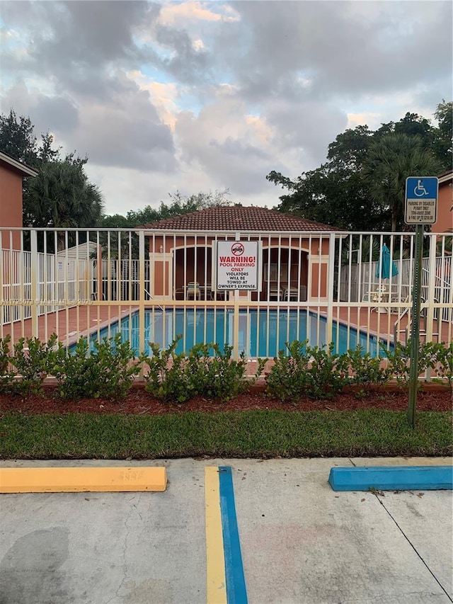 view of swimming pool with a patio area