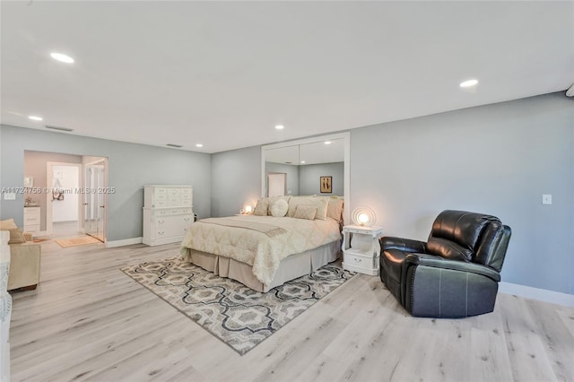 bedroom with light wood-type flooring