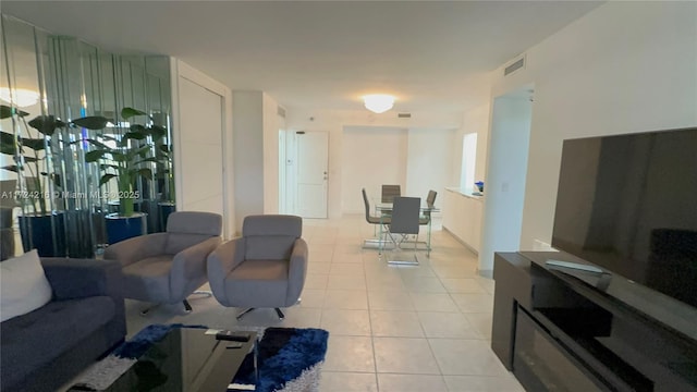 living room featuring light tile patterned flooring