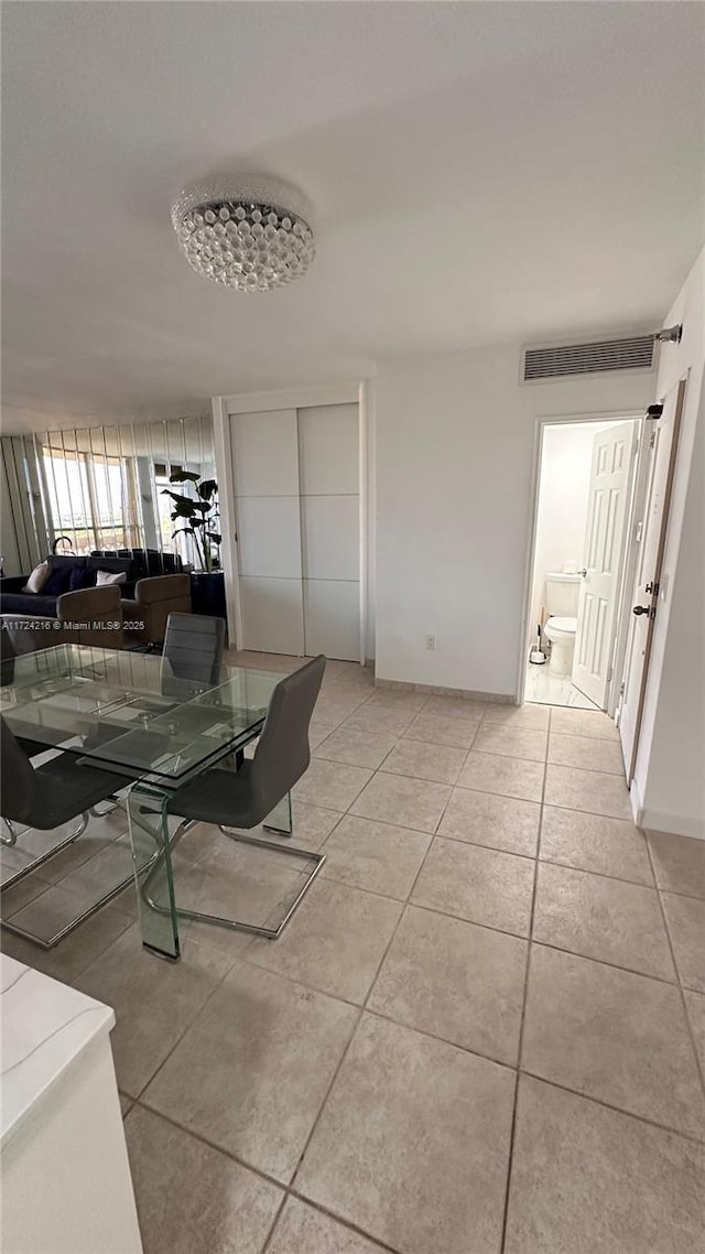 living room with light tile patterned flooring