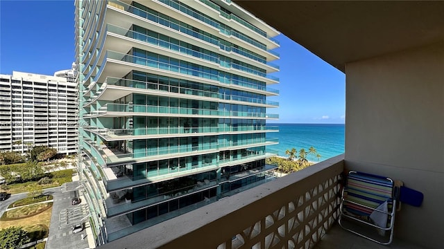 balcony featuring a water view