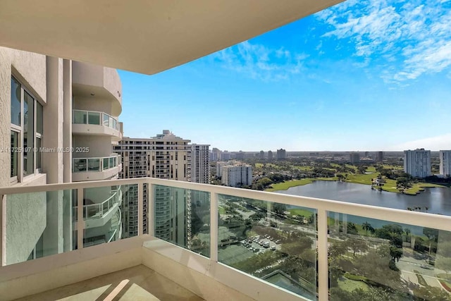 balcony featuring a water view