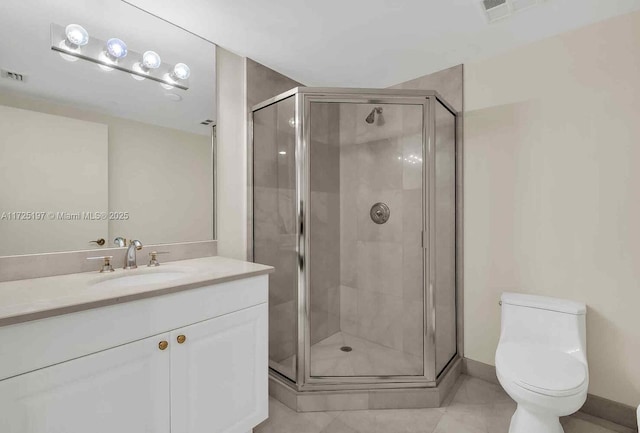 bathroom with vanity, an enclosed shower, and toilet