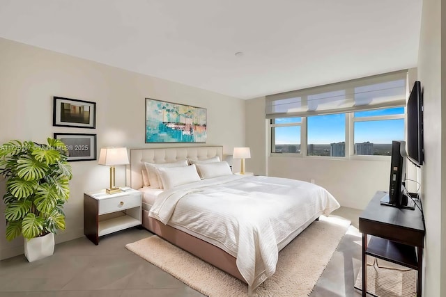 bedroom with concrete flooring