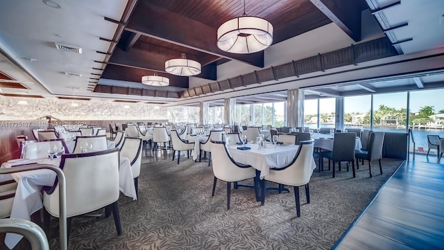 dining space with wooden ceiling