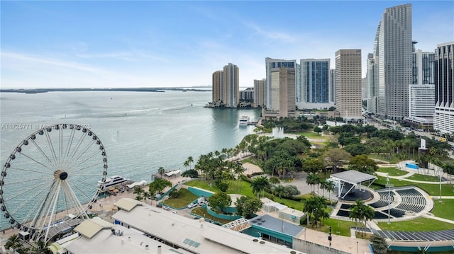 birds eye view of property with a water view