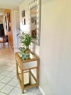 hall featuring tile patterned floors