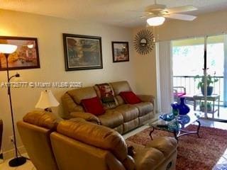 living room featuring ceiling fan