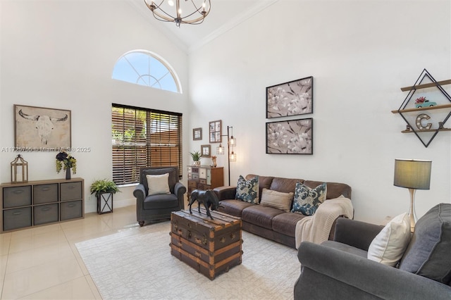 living room featuring light tile patterned flooring, crown molding, high vaulted ceiling, and a notable chandelier