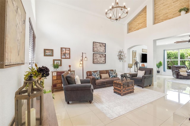 living room featuring a healthy amount of sunlight, light tile patterned floors, and high vaulted ceiling