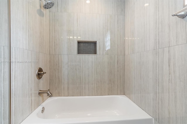 bathroom with shower / washtub combination