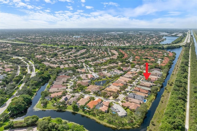 bird's eye view with a water view