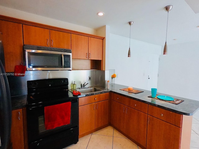 kitchen with kitchen peninsula, decorative light fixtures, black range with electric stovetop, light tile patterned flooring, and sink