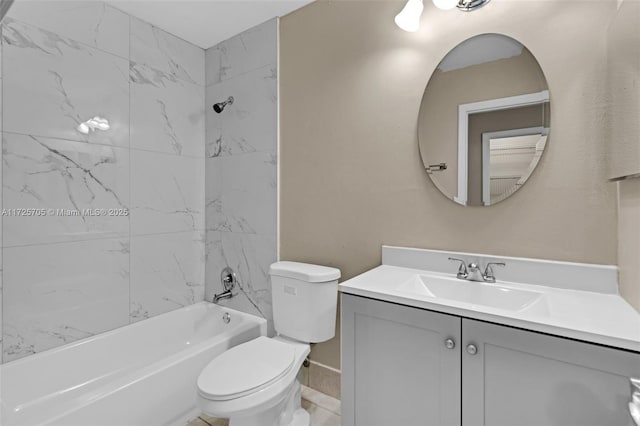 full bathroom with toilet, vanity, and tiled shower / bath combo