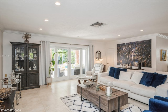 living area with light tile patterned floors, visible vents, recessed lighting, and crown molding