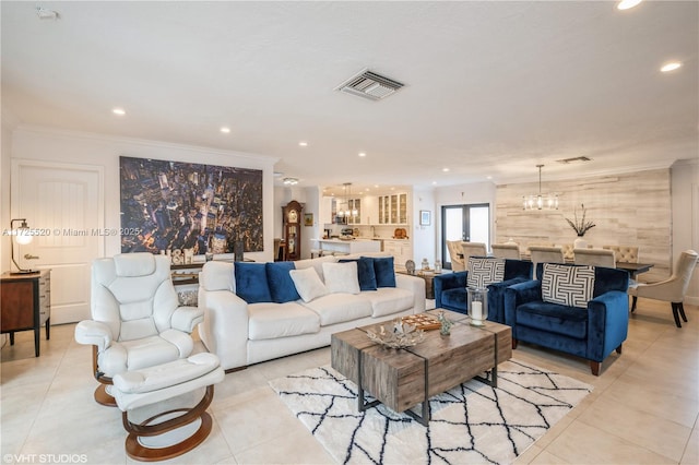 living room featuring visible vents, recessed lighting, crown molding, and an inviting chandelier