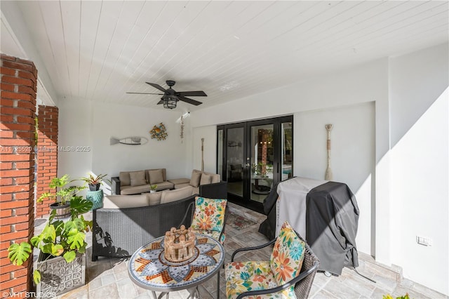 view of patio / terrace featuring area for grilling, an outdoor hangout area, and a ceiling fan