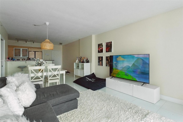 living room with light tile patterned floors