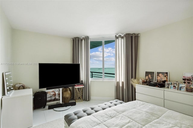 bedroom featuring light tile patterned floors